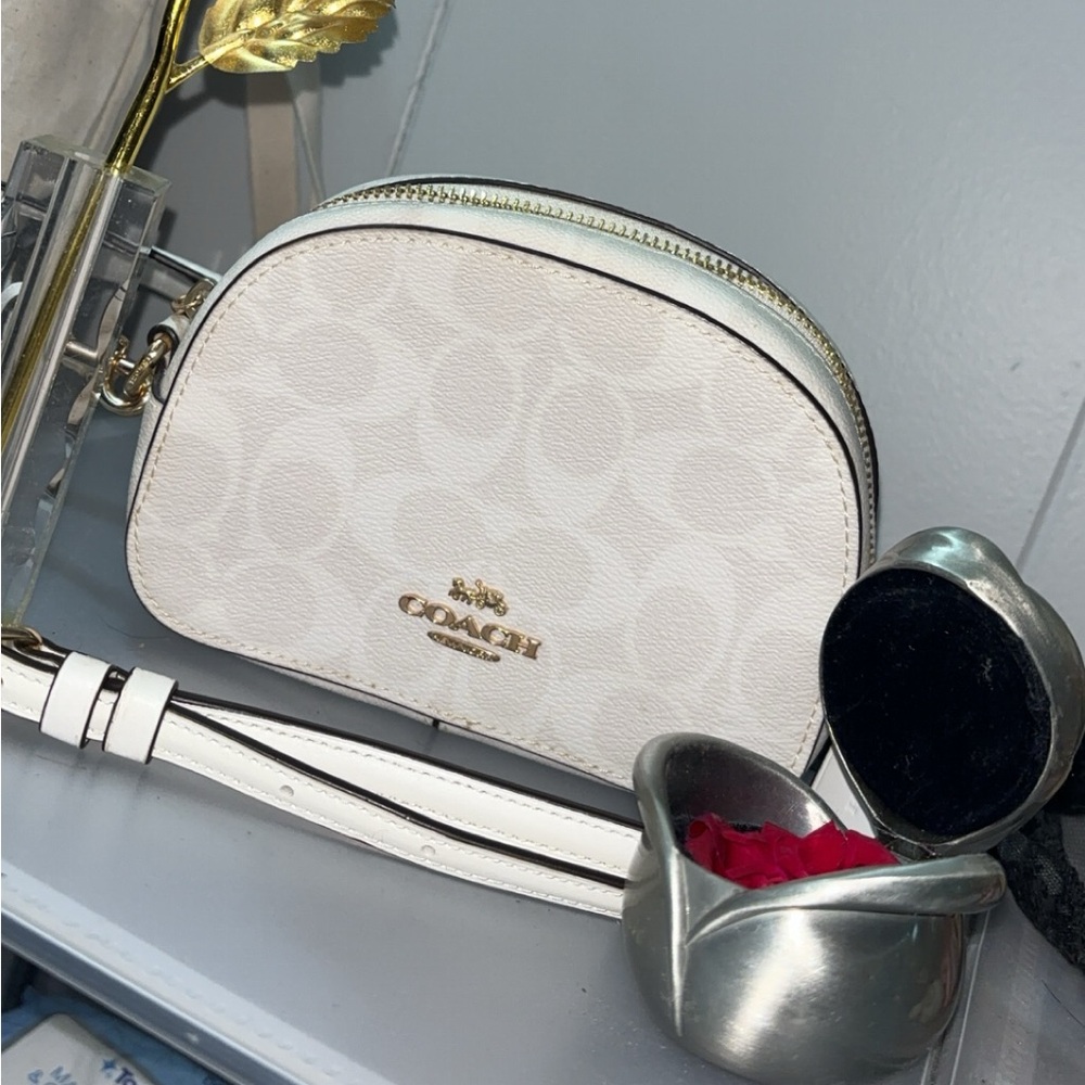 All white Coach Crossbody